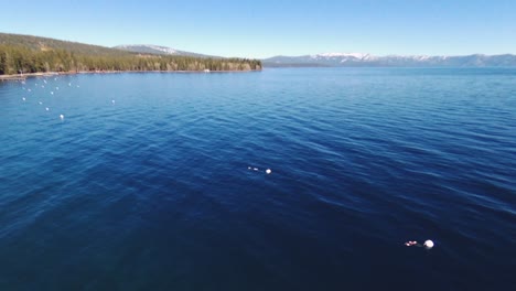 A-blue-lake-of-fresh-water-panoramic-shot-from-above-in-Lake-Tahoe,-NV,-USA