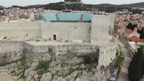 Point-of-drone-view-around-Saint-Michael-fortress-and-Sibenik-aquatorium-panoramic-view