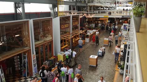 People-or-shoppers-shown-from-above-in-the-busy-tourist-attraction-Cape-Town-V-A-Waterfront-craft-market