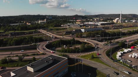 Aerial-view-of-the-big-roundabout-over-the-big-road-Alingsasleden-E20-located-in-Gothenburg,-Sweden