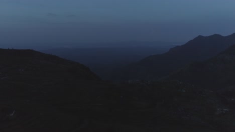 Cinematic-drone-shot---Revealing-shot-of-a-Tea-Factory-on-a-Cliff-before-the-Sunrise
