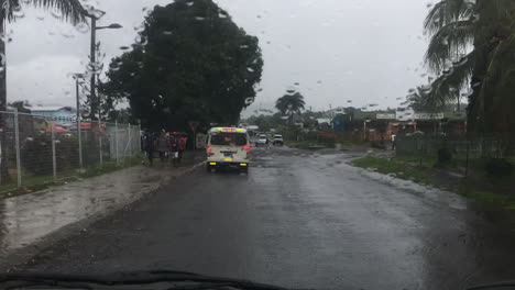 Driving-in-the-rain-in-a-small-town-of-Papua-New-Guinea