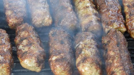 Traditional-food-Meat-Balls-"mici"-on-grill