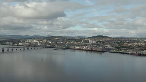 An-aerial-view-of-the-Tay-Road-bridge-and-Dundee-city-on-a-cloudy-day