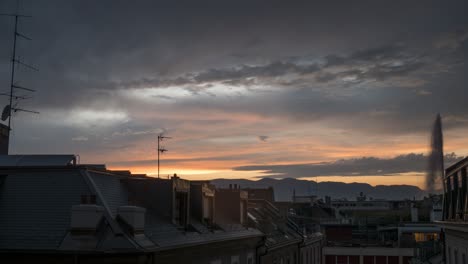Sunset-time-lapse-over-the-rooftops-of-Geneva,-Switzerland