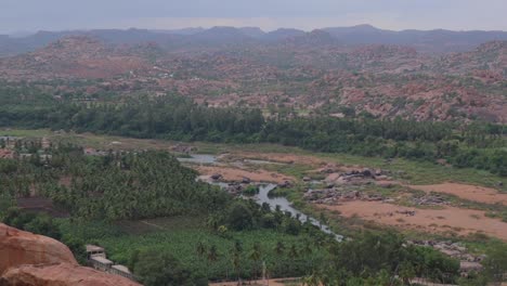 Pan-view-of-Aerial-View-of-Hampi-Virupaksha-temple-and-the-river-from-the-top-of-the-Matanga-Hill