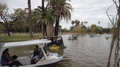 PANNING-RIGHT-Tourists-on-rental-pedal-boats-in-Palermo-woods-lake-beside-rose-garden