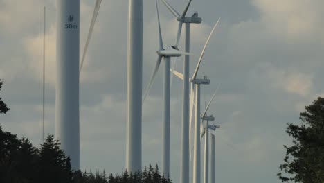 Wind-turbines-rotating-at-a-test-center-for-windpower