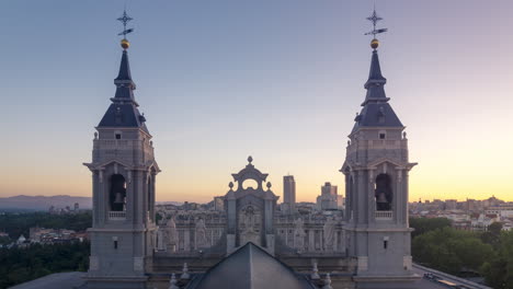 Timelapse-during-sunrise-of-Almudena-Cathedral-in-Madrid,-spain