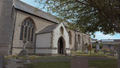 gimbal-shot-walking-through-graveyard-approaching-church