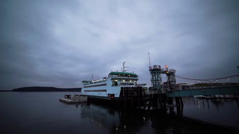 Early-morning-launch-of-the-Point-Defiance-to-Vashon-Island-Ferry,-mostly-cloudy,-gloomy,-calm-salt-water