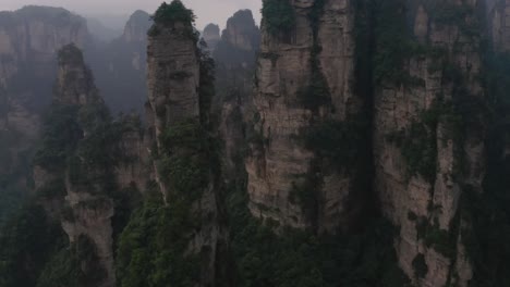 Drone-shot-of-Zhangjiajie-national-park-in-China,-karst-mountains-all-over-the-place