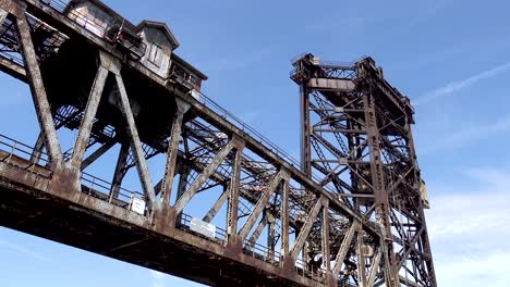 timelapse-of-old-historic-vertical-lift-train-bridge-close-up-going-down-4k
