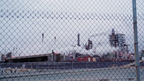 Gas-and-oil-refinery-behind-the-fence