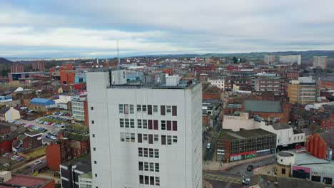 Aerial-views-of-the-main-town-in-the-potteries-Stoke-on-Trent,-Hanley-the-city-centre-with-high-rise-buildings-and-a-beautiful-city-landscape,-immigration-housing-and-high-rise-flats