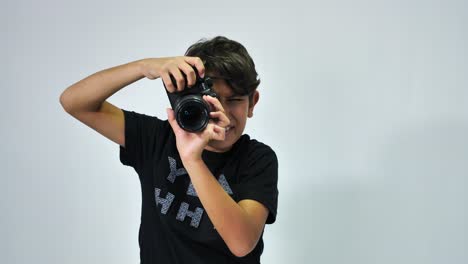 a-child-playing-with-a-camera-and-taking-photos