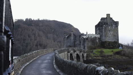Slow-Motion-of-medieval-Eilean-Donan-Castle-in-moody-Scotland,-Europe