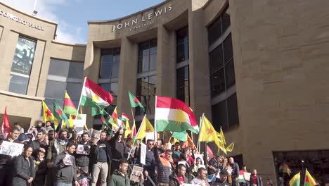 Close-up-of-people-protesting-against-the-Turkish-occupation-and-ethnic-cleansing-of-the-Kurds-in-Glasgow