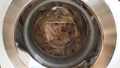 Waschmaschine-Voller-Schmutziger-Wäsche