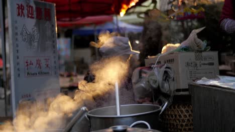 Steaming-outdoor-cooking-at-morning-market-at-Shaxizhen-Shaxi-village
