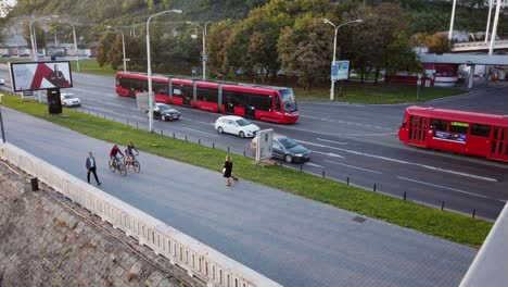 Traffic-and-light-rail-transit-train-on-riverside-Street-in-Bratislava
