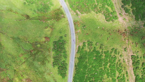 Aerial-top-down-view-of-a-country-road,-shot-in-the-English-Lake-District