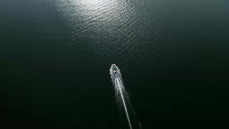 4K-Boat-on-Lake-Drone-High-to-Low