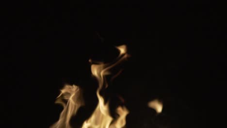 Bonfire-flames-in-a-dark-background.-Slow-motion