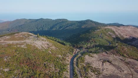 Aerial-shot-of-high-altitude-mountain-landscape-with-road-on-Madeira-Island