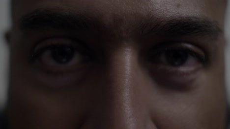 Adult-UK-Asian-Male-Looking-Directly-At-Camera-Pensively