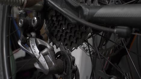 View-Of-Dirty-Shimano-Alivio-Derailleur-And-Rotating-Bike-Cassette