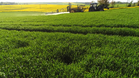 Spraying-the-herbicides-on-the-green-field