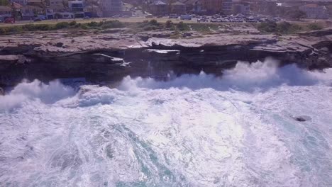 Aerial-view-of-ocean-waves-and-amazing-rocky-coast-at-Sydney
