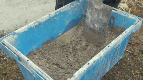 Pouring-water-in-with-sand-and-gravel-making-cement