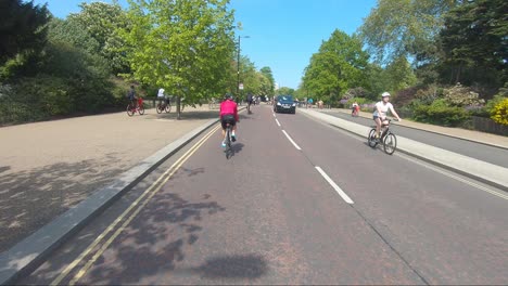 Cyclists-Riding-Through-Serpentine-And-Stopping-At-Pedestrian-Crossing-During-Lockdown-In-London