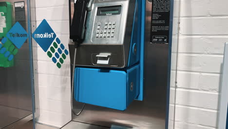 Telkom-South-African-Pay-Phone,-continuous-close-shot-top-to-bottom