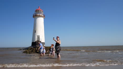 Tourist-family-taking-selfie-at-Landmark-Ayr-lighthouse