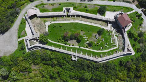 Slow-top-view-over-ancient-Peristera-fortress-in-Peshtera,-Bulgaria