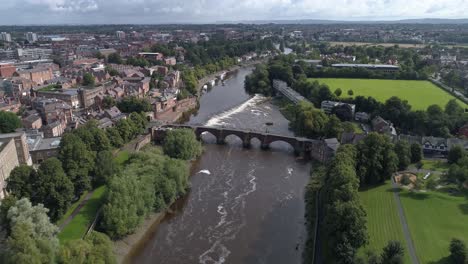 Aerial-high-pass-above-River-Dee-in-Chester,-England