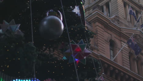 Close-up-of-a-huge-christmas-tree-ornaments-on-a-tree-in-Melbourne-City-Centre