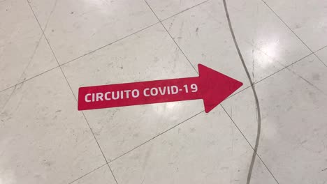 COVID-Circuit-red-arrow-floor-sticker-in-Clinic---Hospital