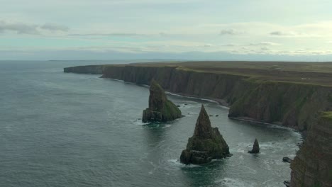 Aerial-view-of-Duncansby-Head-and-sea-stacks-on-an-overcast-day