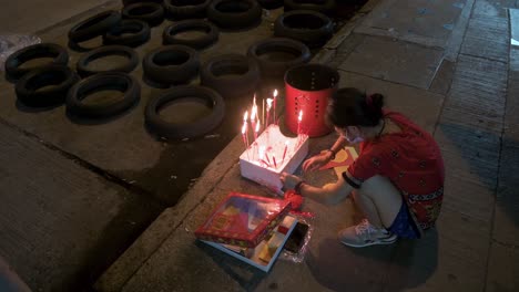Residents-burn-paper-money-during-the-Hungry-Ghost-Festival