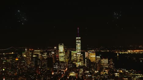 Aerial-Panorama-shot-showing-firework-above-New-York-City-Skyline-at-night-during-New-Year-Celebration