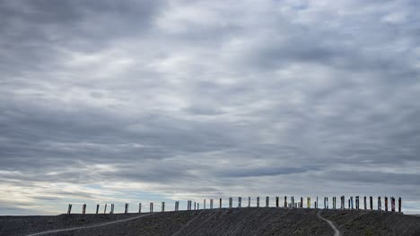 Timelapse-of-clouds-passing-over-the-art-installation-by-the-Basque-artist-Augustín-Ibarrola-on-Halde-Haniel-in-Bottrop,-Germany