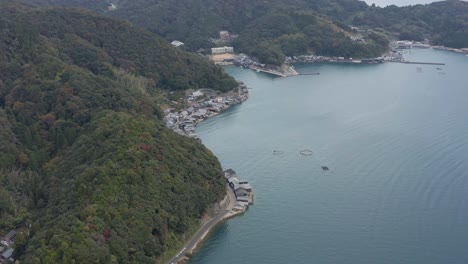 Aerial-Tilt-Reveal-Shot-of-Ine-cho,-Small-Fishing-Village,-Kyoto-Japan