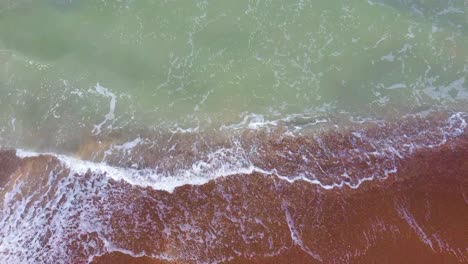 Aerial-Dron-Shot-of-the-Baltic-Sea-Costline-With-Waves-View-From-Above