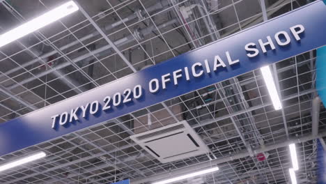 Tokyo-2020-Official-Shop-Sign-Of-The-Cancelled-Olympic-In-Tokyo,-Japan