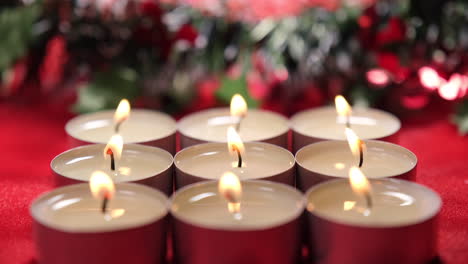 Christmas-candle-light-on-red-background-decoration