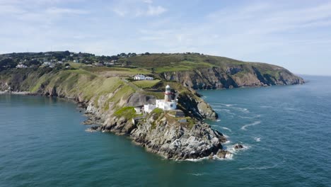 Flying-around-The-Baily-Lighthouse-at-Howth-Head-during-a-sunny-day